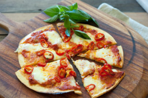 Gluten free pizza with sundried tomatos.