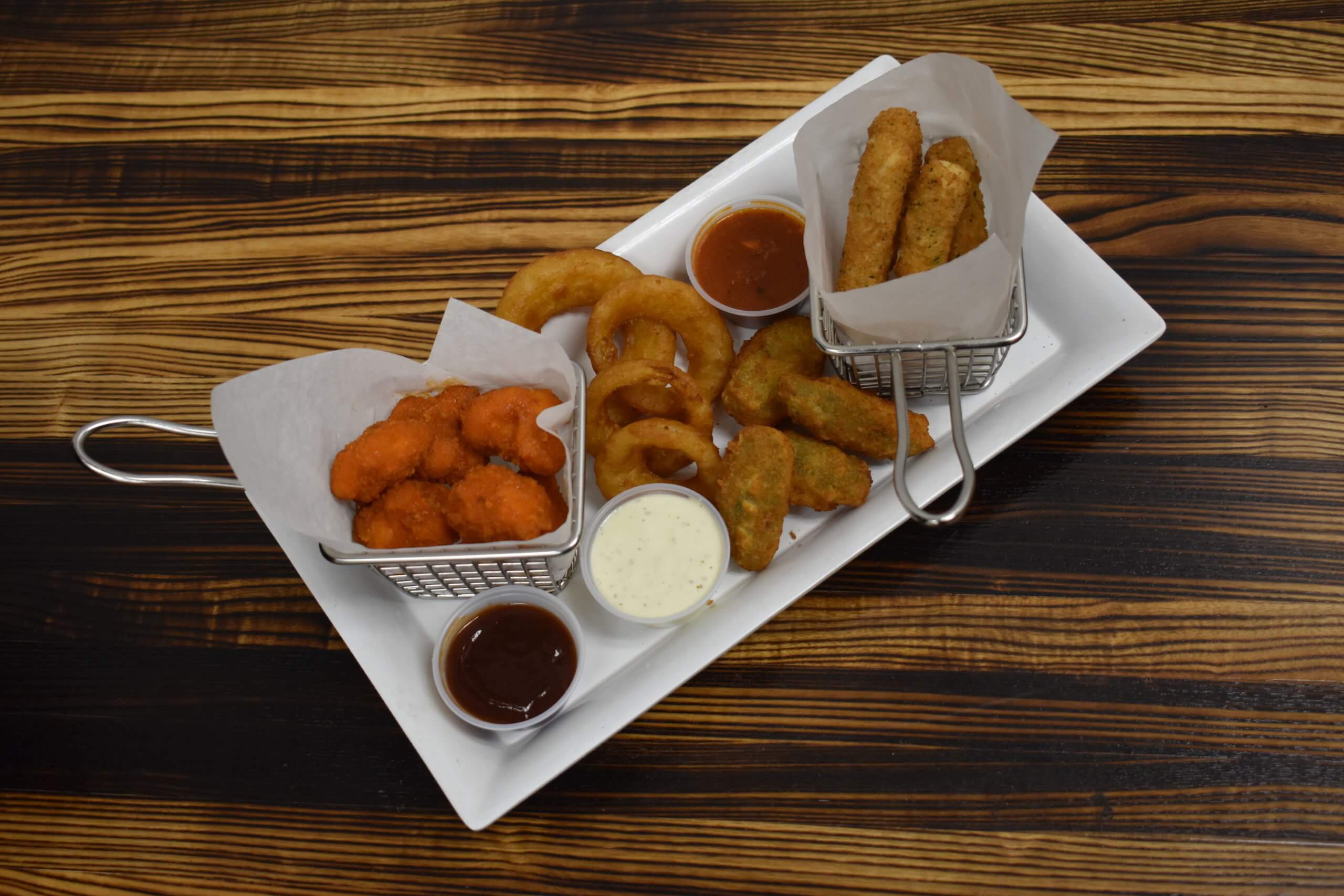 Appetizer combo plate at Pequod's Pizza.