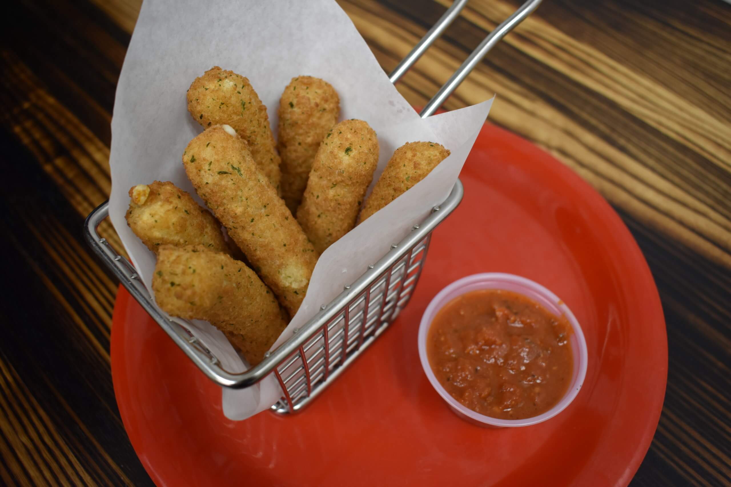 Mozzarella sticks appetizer from Pequod's Pizza.